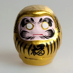 Daruma 5,5 cm, gold, stärkt das Durchhaltevermögen, sein Ziel zu erreichen - Bild 1 von 1