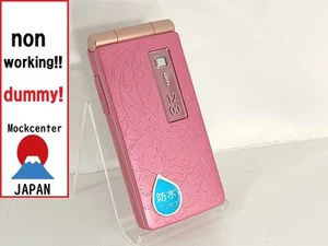 【Factice !】 Kyocera W65K (couleur rose) au-japon téléphone portable qui ne fonctionne pas - Photo 1 sur 3