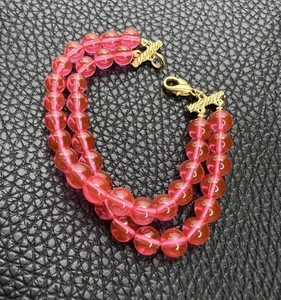 Bracciale vintage fatto a mano con perline in vetro rosa 7" - Foto 1 di 9