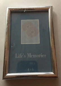 Paquete de 3 marcos de fotos de vidrio con adornos plateados para montaje en pared. - Imagen 1 de 2