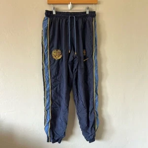 Pantaloni Nike NBA Golden State Nylon BasketBall Track Jogger Capodanno Cinese - Foto 1 di 9