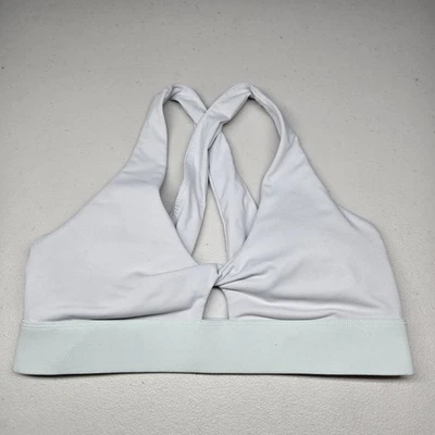 Sujetador deportivo Fabletics para mujer grande gris claro inalámbrico espalda deportiva pulóver Foto 1 de 4