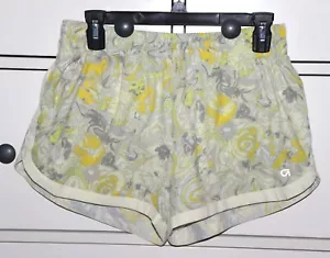 Pantalones cortos para correr para mujer GapFit ""G Sprint"" amarillo floral talla M ~ 2,75" entrepierna - Imagen 1 de 8