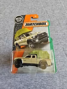 2017 Matchbox 16 TOYOTA TACOMA Tan 86/125 LITTLE BEND Explorers - Picture 1 of 6