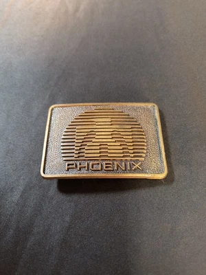 Auténtica hebilla de cinturón vintage Phoenix Thunderbird Caterpillar Tractor Company Foto 1 de 4