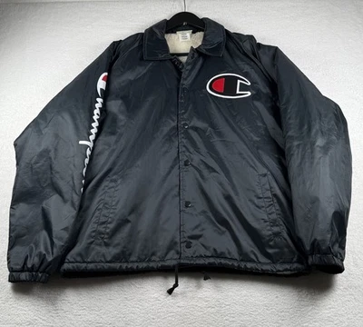 Chaqueta cortavientos grande de colección Champion Sherpa forrada negra frontal a presión para hombre Foto 1 de 4