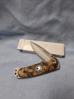 Cuchillo plegable Air Cat de 8 pulgadas con punto de caída  Foto 1 de 4