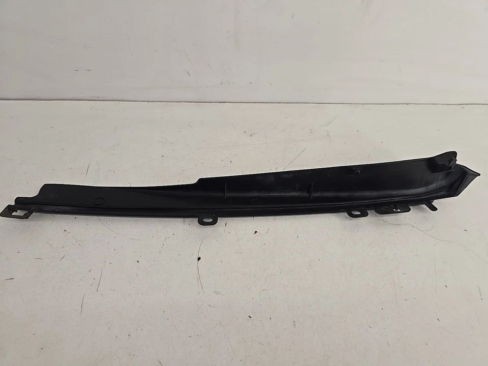 Protector moldura guardabarros delantero izquierdo Toyota Camry 2007-2011 53825-06020 OEM Foto 1 de 4