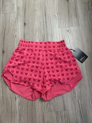 NUEVO CON ETIQUETAS Lululemon Disney Hotty Hot Pantalones Cortos de tiro alto 4" Rosa Mickey Mouse Talla 6 DYCP Foto 1 de 4