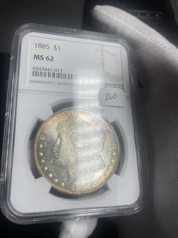 1885 Morgan Dollar Reverse Rainbow Toning NGC MS62 Looks PL Cover