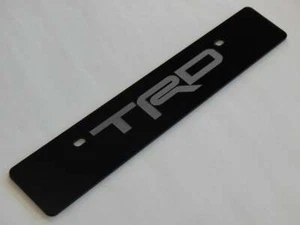 Front license plate delete with U.S. LP mounting holes engraved with TRD - Bild 1 von 1