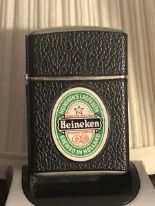 Accendino Heineken vintage anni '60 flip top in pelle made in Austria molto bello - Foto 1 di 12