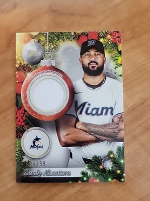 2025 TOPPS HOLIDAY BASEBALL PLAYER RELICS GLITTER SANDY ALCANTARA MARLINS 24/99 - Image 1 of 3