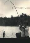 1991 Press Photo Marge Fuhst Reels In Walleye At Lake Of The Woods In Wisconsin