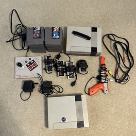 Authentic Nintendo (NES) Lot Of 18 Games, 2 Consoles, 4 Controllers And More