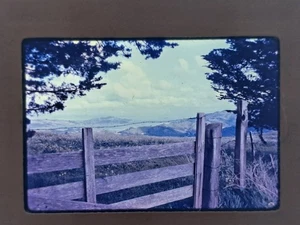 Vintage 35mm Ektachrome Slide Scenic Landscape Fence Hills Blue Sky - Picture 1 of 3