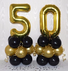 50° COMPLEANNO - 50 ANNI - ORO/NERO - ESPOSITORE PALLONCINI LAMINA - CENTROTAVOLA - Foto 1 di 4