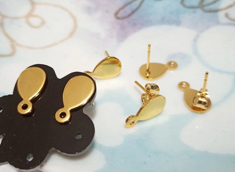 2 coppie orecchini perni  in acciaio inox goccia colore oro 13x7mm bijoux - Immagine 1 di 1