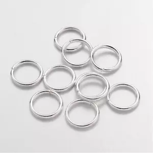 LOT OF 100 12 x 1.2mm SILVER NICKEL-FREE CONNECTOR RINGS STRONG beads! - Picture 1 of 1