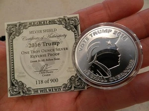 2016 1OZ Vote Trump/ Vote Hitlery Proof Oligarchy - Silver Shield COA #118 Set  - Picture 1 of 7