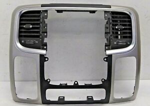 2013-2020 DODGE RAM CENTER DASH BEZEL WITH AIR VENTS OEM 1VY951X9AG