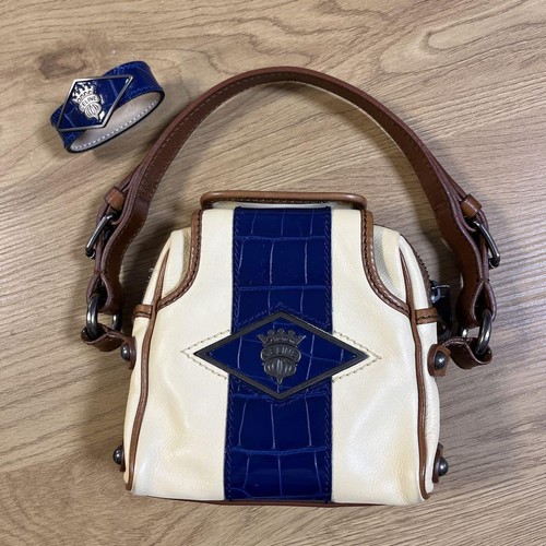 Mini borsa Celine e bracciale in pelle