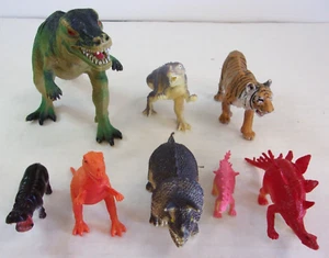Used Vintage Lot of 8 Plastic Dinosaurs PVC Allosaurus Tiger Mixed Colors - Picture 1 of 2