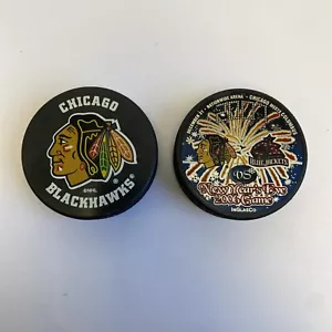 Two NHL Hockey Pucks- Chicago Blackhawks/ 06’ New Years Game Chicago VS Columbus - Picture 1 of 7