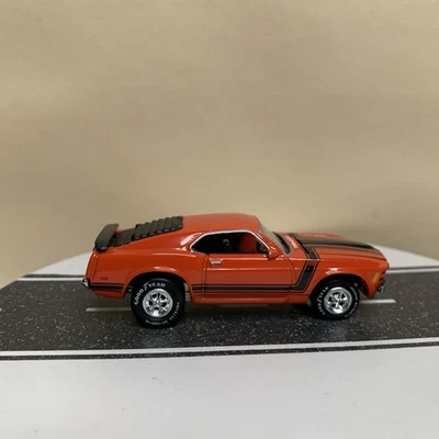 Johnny Lightning Muscle Cars EE. UU. 1970 Ford Mustang Boss 302 naranja/negro 1:64 casi nuevo Foto 1 de 4