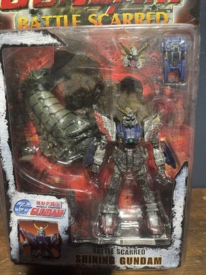 Figura de acción Bandai Battle Scarred Shining Gundam 4,5". Caja nueva tiene desgaste  Foto 1 de 4
