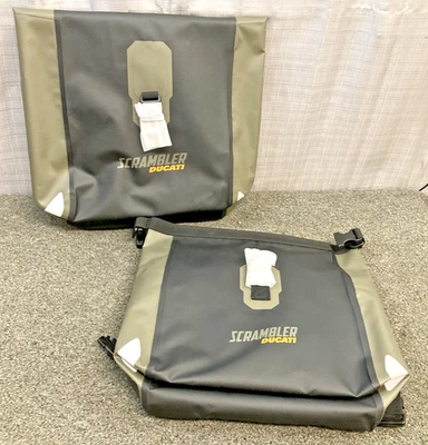 NOVAS BOLSAS LATERAIS GENUÍNAS DUCATI 96780751A SCRAMBLER ENDURO - Imagem 1 de 4