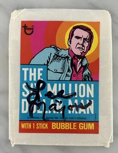 LEE MAJORS AUTOGRAMM SIGNED 1974 SIX MILLION DOLLAR MAN TEST ISSUE WRAPPER JSA - Bild 1 von 3