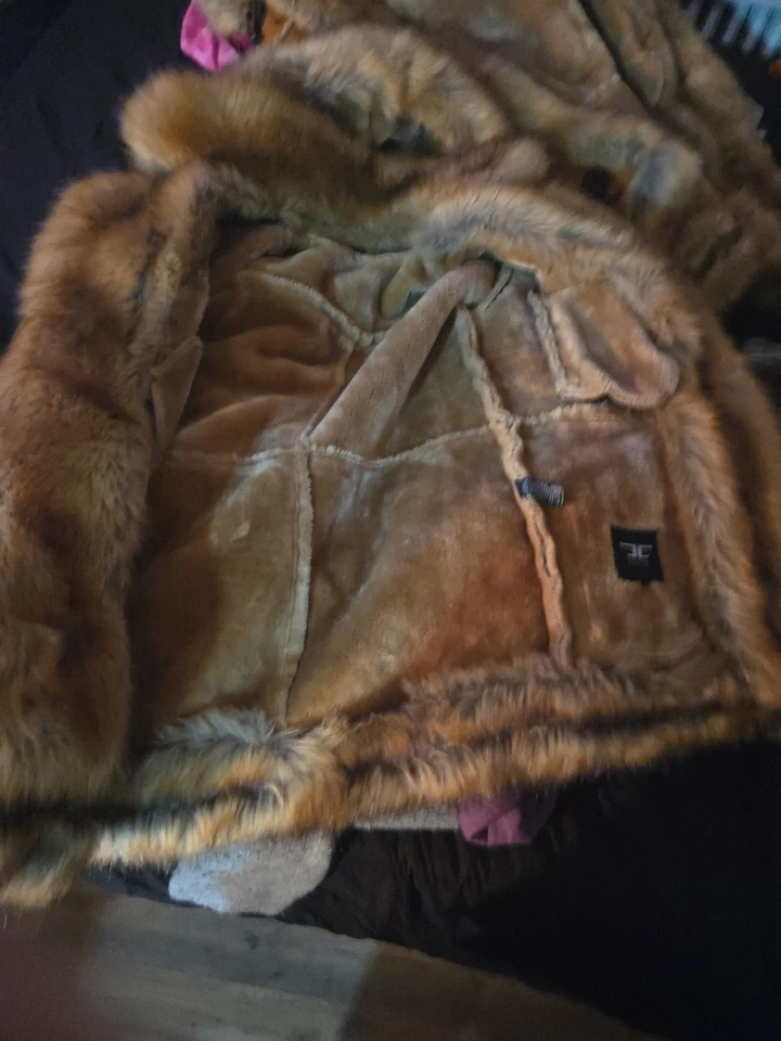 Abrigo negro de cuero de ley para mujer Foto 1 de 4