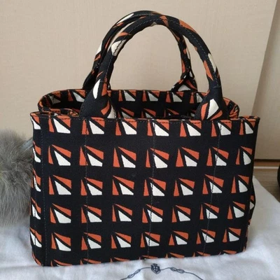 Почти как новый PRADA Канапа сумка с короткими ручками холст черный оранжевый белый геометрический узор - Изображение 1 из 4