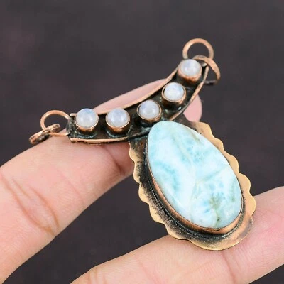Oferta de San Valentín Cobre Garganta Chakra Natural Larimar Arco Iris Piedra Lunar Colgante Foto 1 de 4