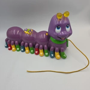 Juguete de música educativa interactivo púrpura oruga pal alfabeto rana salta 2001 - Imagen 1 de 8