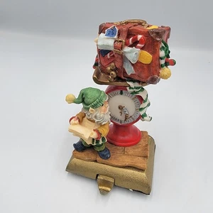 Vintage Gusseisen Strumpfhalter Aufhänger Weihnachtsmann Elfe Geschenke Gepäck Harz - Bild 1 von 7