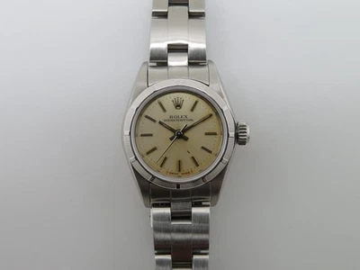 Reloj de pulsera Rolex Oyster Perpetual 67230 26 mm para dama - esfera patinada - usado Foto 1 de 4