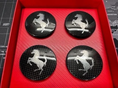 NEW FERRARI CARBON FIBER WHEEL CENTER CAPS P/N70005609 - Image 1 of 4