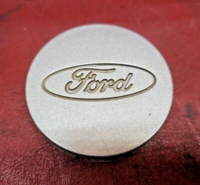 1998-2003 Ford Escort prata OEM tampa central cubo tampa poeira F3CC-1A096-AA - Imagem 1 de 4