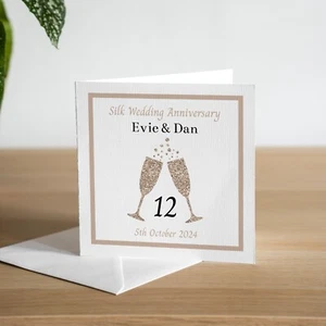 Tarjeta personalizada 12o aniversario de boda de seda vaso de champán esposo esposa - Imagen 1 de 3