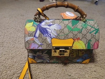 Bolso gucci mujer bambú Handel flor tela.  Precioso bolso muy buen estado  Foto 1 de 4