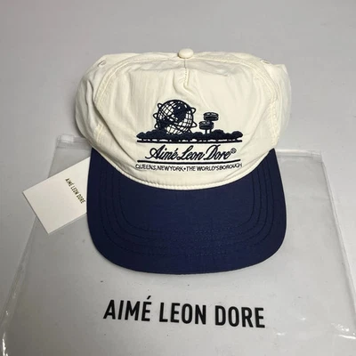 TOTALMENTE NUEVO Sombrero de Nylon Aime Leon Dore Unisphere Blanco/Azul Marino AGOTADO! Foto 1 de 3