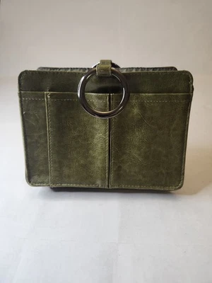 Bolso organizador de mano Pouchee The Ultimate verde cierre magnético asas de anillo de metal Foto 1 de 4