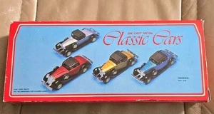 Coches clásicos vintage de metal fundido Emson Freewell 4 no. 307-310 ¡ANTIGUO STOCK!! - Imagen 1 de 4