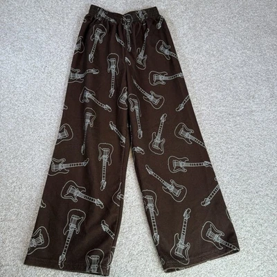 Pantalones de pijama de guitarra Carter’s Boys marrón polar talla 7 Foto 1 de 4