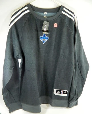 Sudadera gris cuello redondo emitida por el equipo New Orleans Hornets talla XL Foto 1 de 4