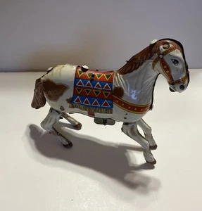HAJI MARK VINTAGE TIN WIND UP JUMPING HORSE - Picture 1 of 2