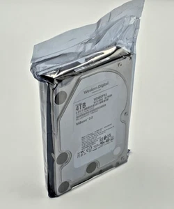 WD RED NAS HDD 4TB 5.4K 6G SATA 64MB CACHE 3.5" LFF NASWARE 3.0 WD40EFRX-68N32N0 - Bild 1 von 6