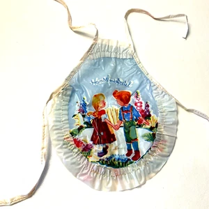 Grembiule bambola vintage Hansel e Gretel plastica vinile ~ 7” x 6” - Foto 1 di 11